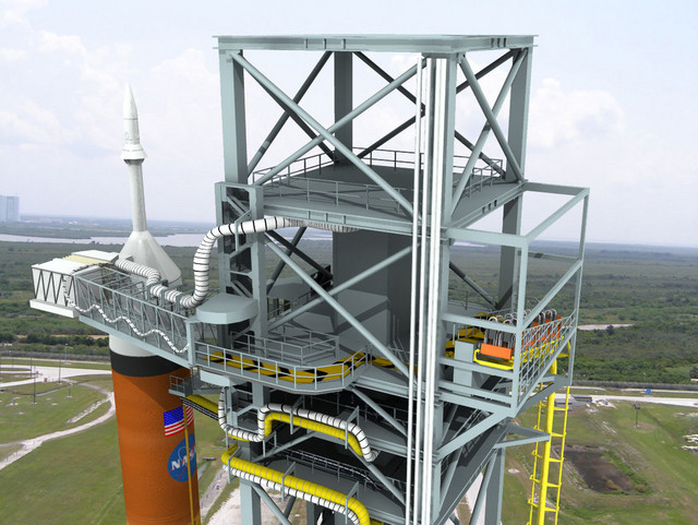 An artist's concept of the Ares I launch pad shows the new evacuation system on the right. Image Credit: NASA