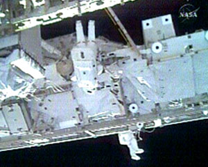 The ISS Expedition 16 crew wires the Harmony module in Space