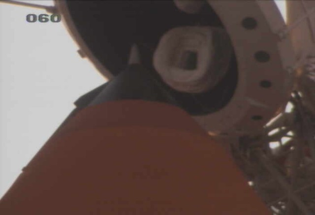 A close-up view of the top of the external tank and the tanking adapter.
Image Credit: NASA public Webcam