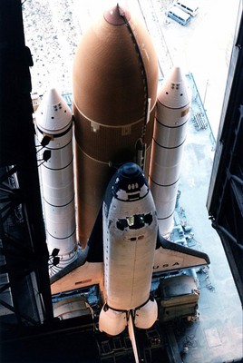 Shuttle rolls out of VAB to the launch pad (STS-83 mission)
