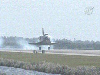 Space shuttle Discovery lands at Kennedy Space Center, Florida