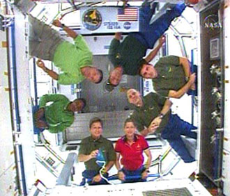 Joint STS-120 and Expedition 16 Crews inside the newly added Harmony module