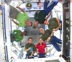 STS-120 and Expedition 16 crew members gather in the new Harmony module to talk to the press. Image credit: NASA TV