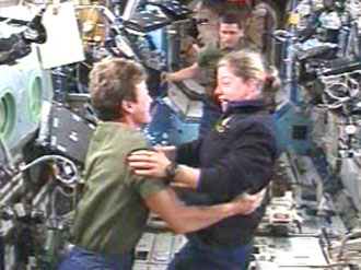 Discovery's STS-120 Crew is greeted by the ISS Expedition 16 Crew