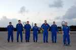 Space Shuttle Discovery's crew arrives at Kennedy Space Center.