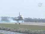 Space shuttle Discovery lands at Kennedy Space Center, Fla. Image credit: NASA TV 